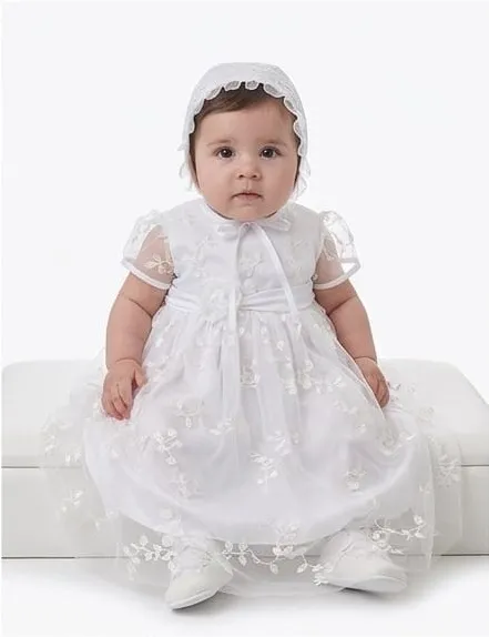03_baby_wearing_dress.webp