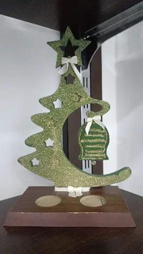[132] Small green tree with a bell 